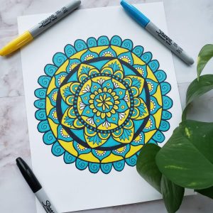 blue and yellow mandala drawing