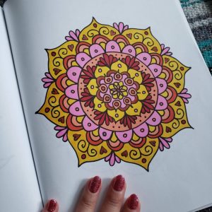 pink yellow and orange mandala drawing