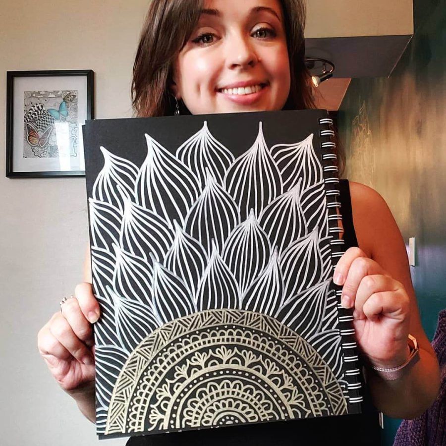 metallic mandala art on black paper