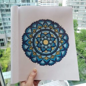 blue and yellow mandala coloring book page