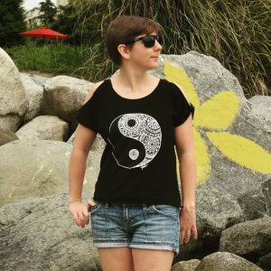 brunette girl modeling black and white yin yang t-shirt
